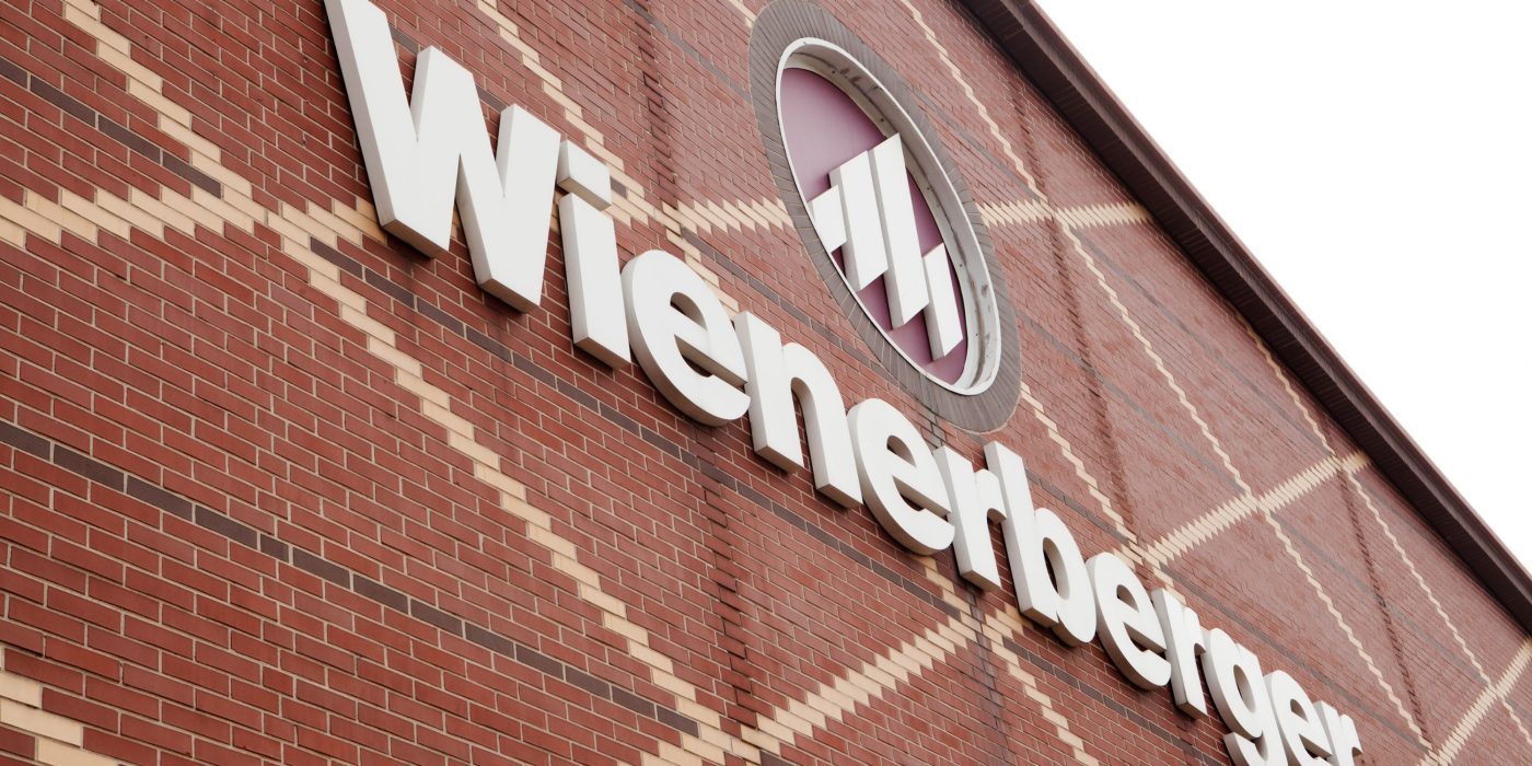 Production plant in Hennersdorf, plant in Hennersdorf, Logo on building wall