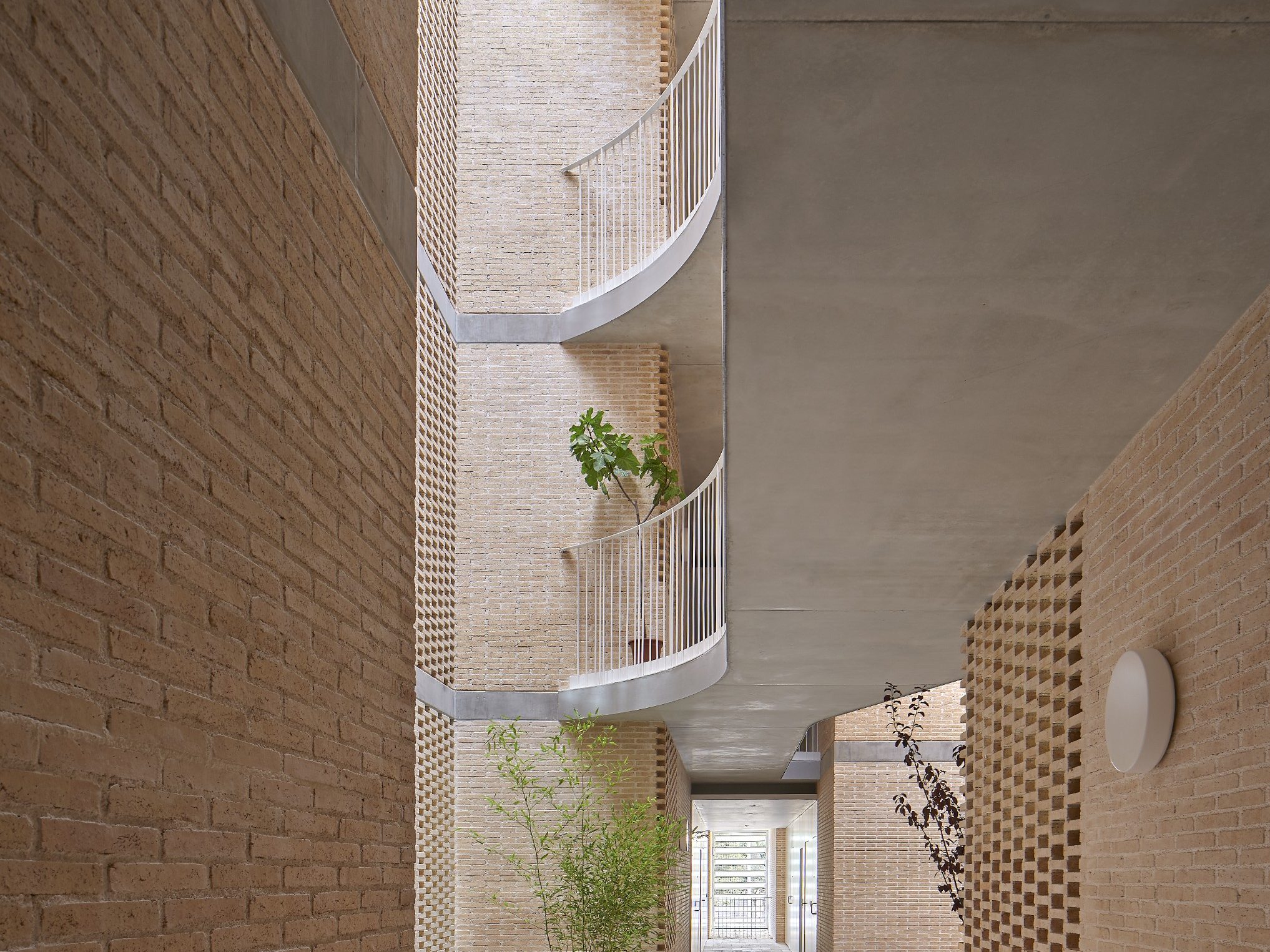 Brick Award 26 Nominee SOCIAL ATRIUM - 54 DWELLINGS IN THE BESÒS - Peris+Toral